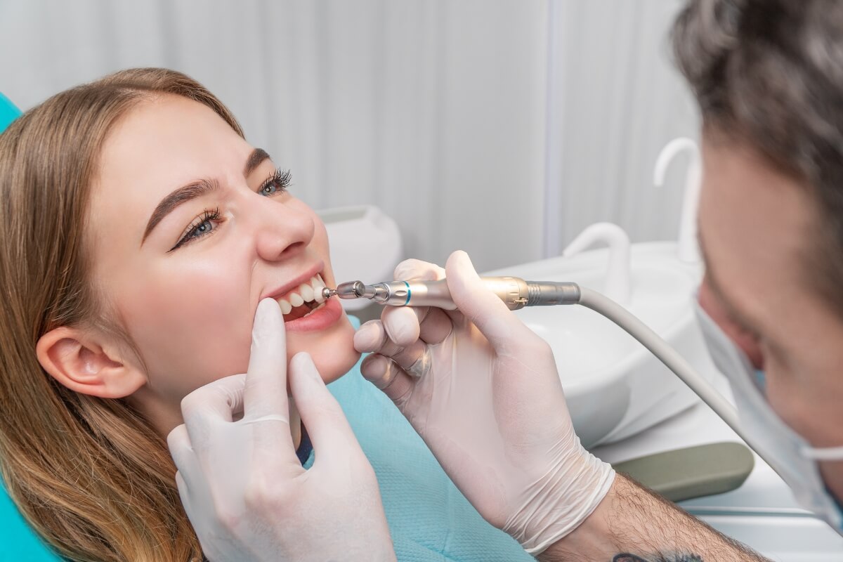 Dentist-Cleaning-Young-Woman-Teeth Dentist Cleaning Young Woman Teeth