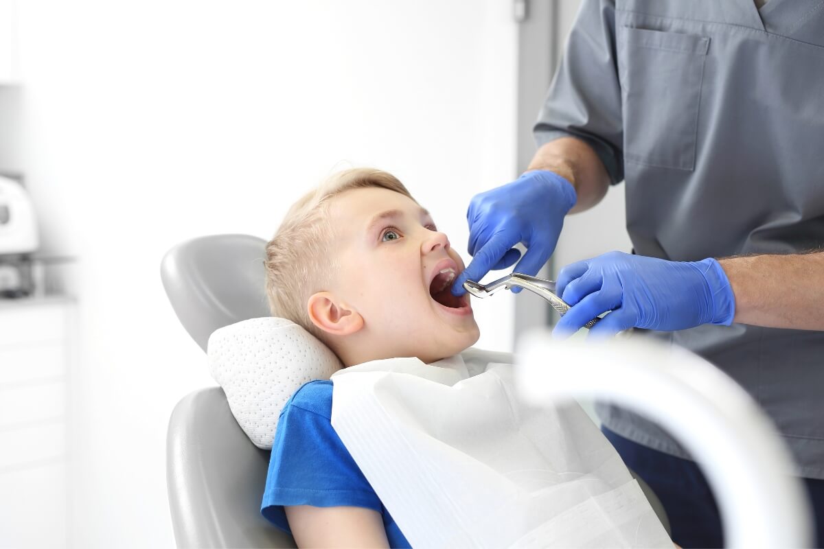 Tooth-Extraction-Of-Child-Boy Tooth Extraction Of Child Boy